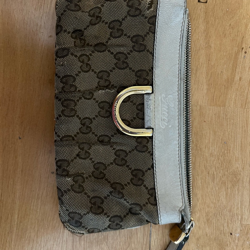 SOLD ‼️‼️USED Gucci Brown and Cream Clutch with Iconic Monogram